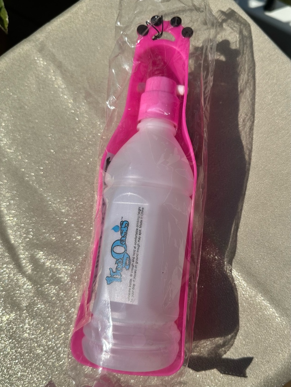 Oasis Pink Travel Bottle with Silicone Carrier for dog